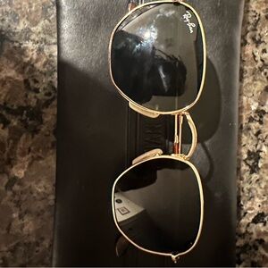 Ray-Ban Gold and Black Sunglasses with Aviator Style and Anti-Glare Lenses